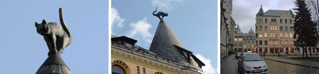 Скульптуры котов на крыше